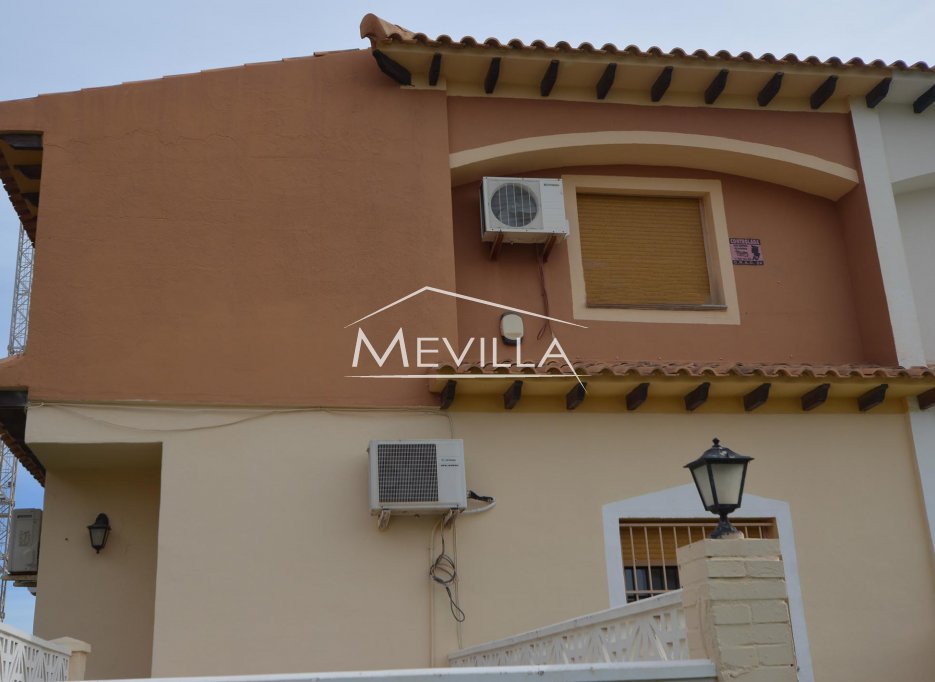 Terraced house less than 100 meters from the beach for sale in Punta Prima